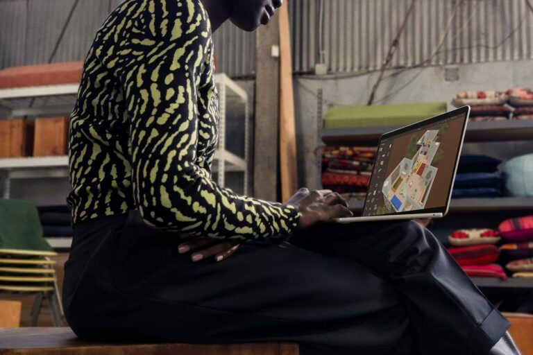 A woman using the Apple MacBook Air M3.