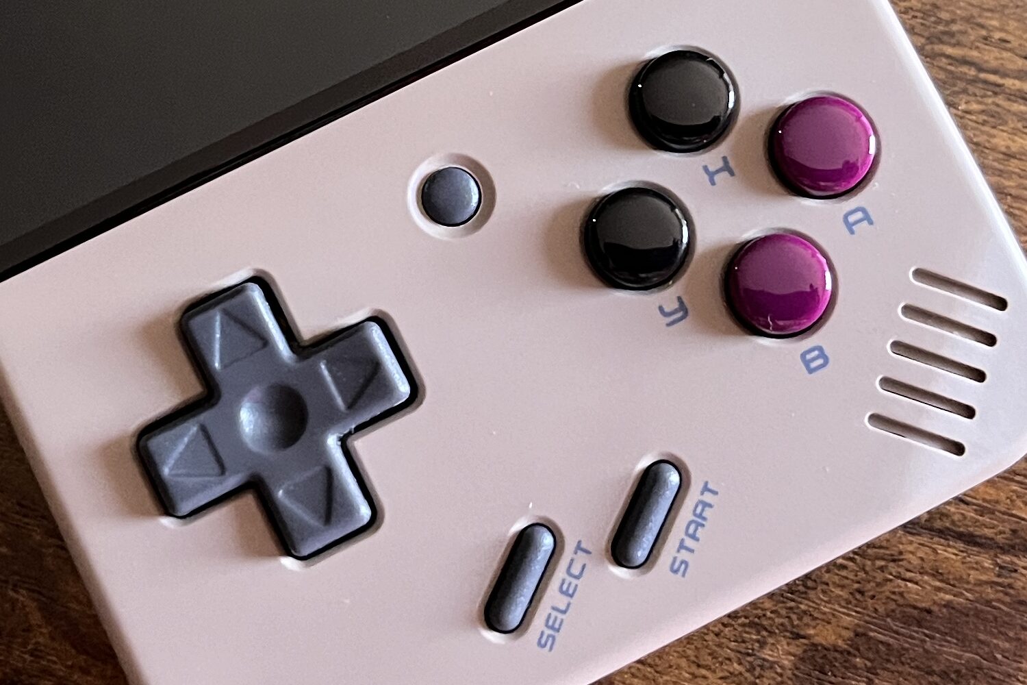 A close-up shot of the Miyoo Mini controls